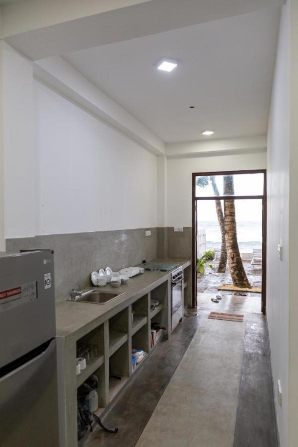 Asa Bay Beach Resort Talpe Bagian luar foto