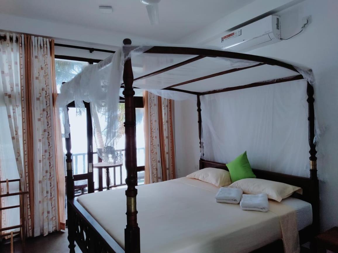 Asa Bay Beach Resort Talpe Bagian luar foto